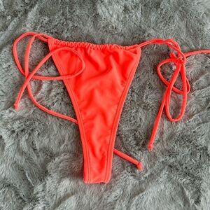 Betty Jade thong style side tie bikini bottoms size L
